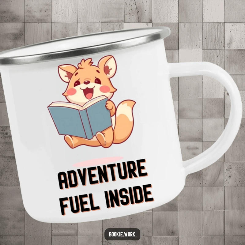Funny camping mug with a cute animal character jumping excitedly, holding a book, perfect for outdoor reading enthusiasts and gifts.